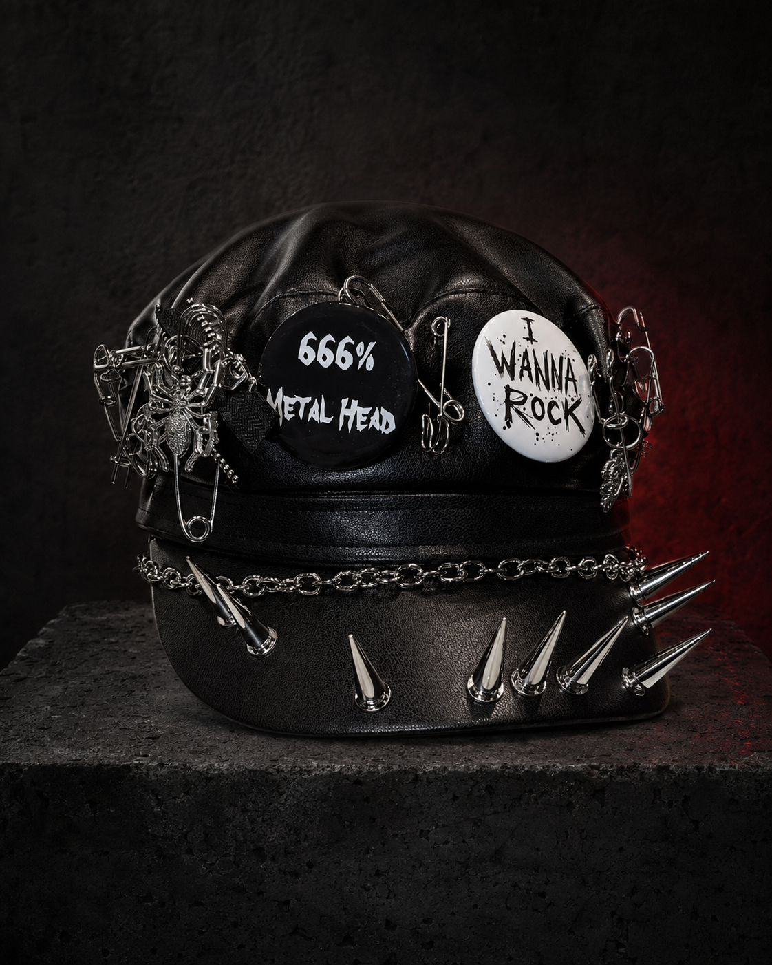 Black gothic cap with 666 percent Metal Head and I Wanna Rock badges, chains and spikes